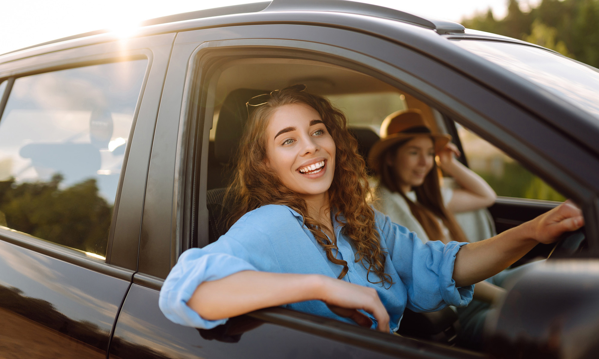 Image of a woman driving a car